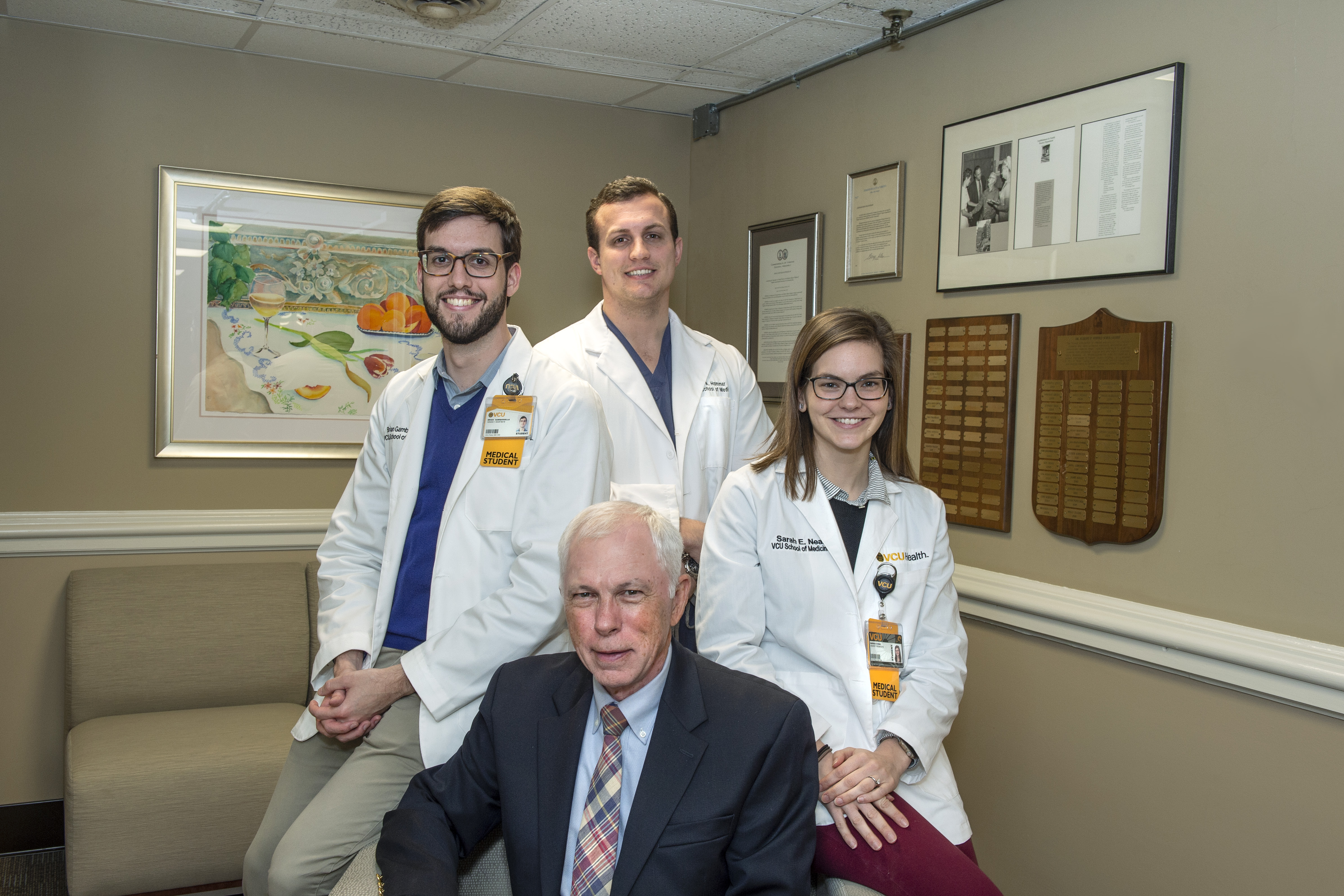 Family medicine students with donor